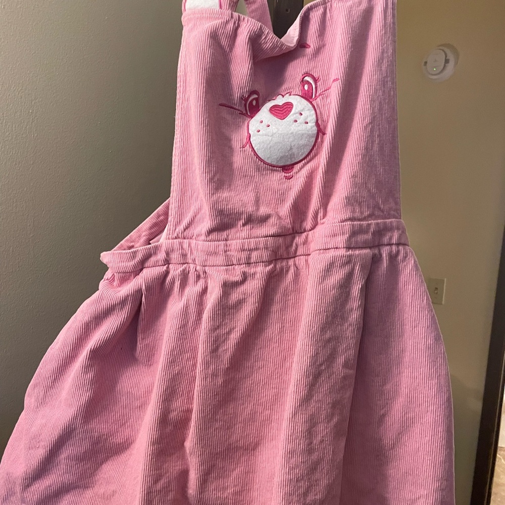 Dolls Kill Pink Corduroy Care Bears Cheer Bear Overall Dress